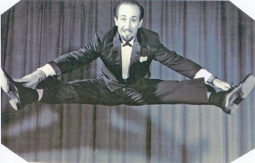Mr. John Ray at age 40 entertaining with his center split leap!