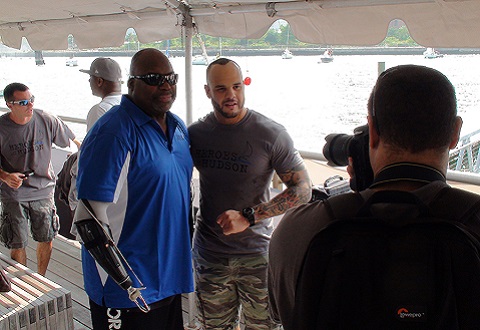 Chris Melendez, disabled Army Veteran, TNA Wrestling star and grand marshal of the 4th Annual Heroes on the Hudson event, at Pier 66 in Manhattan, greets a disabled Veteran. Chris Melendez, disabled Army Veteran, TNA Wrestling star and grand marshal of the 4th Annual Heroes on the Hudson event, at Pier 66 in Manhattan, greets a disabled Veteran.